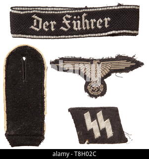 Rottenführer Albin Dunkel, Regiment 'Der Führer' - insignien einer Manschette Titel 'Der Führer', 1. Modell mit gotischen Skript, in Silber - gewebt 'flatwire'-Problem für Führungskräfte. Verwendet, bis 36 cm in der Länge angepasst, von einem einheitlichen entfernt. Ein recht Nackenspiegel mit Silber - gewebt SS-Runen (flatwire), eindeutig mit Motten Schäden auf der Rückseite verwendet. Eine einzelne Schulter Board für Soldaten der Infanterie, mothy. Ein silber-grau gewebte Hülse Eagle (BeVo) auf schwarzem Sockel verwendet und von dem einheitlichen getrennt. historischen, historische, 20. Jahrhundert, 1930S, 1940s, Waffen-SS, bewaffneten Division der SS, bewaffneten se, Editorial-Use - Nur Stockfoto