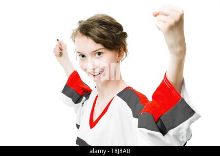 Sport Fan in Jersey in Rot, Grau Farben jubeln, feiern Ziel - Seitenansicht - Weißer Hintergrund Stockfoto