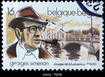 Roman Schriftsteller Georges Simenon auf belgische Briefmarke Stockfoto