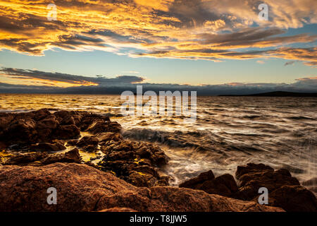 Freycinet National Park - Wineglass Bay Kreisspur. Tasmanien. Sonnenuntergang Stockfoto