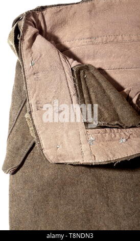 Hose M44 für Soldaten - ein Depot Stück die Hose in rauen, erdbraun Wolltuch. Seitliche Taste-Taschen, zwei Hüft- und eine Uhr Tasche. Mit Gurten und Tangas an der Taille und Bein endet. Am Bund depot Stempel und RB-Nummer, genäht Lederband mit Größe reverse Stempeln' 21/4 +9513 T 23/4". Diverse Tasten, große Größe. Minimal getragen, sehr selten. historischen, geschichtlichen, Armee, Streitkräfte, Bundeswehr, Militär, Militaria, 20. Jahrhundert, Editorial-Use - Nur Stockfoto