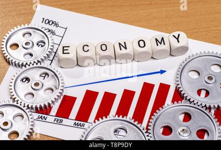 Diagramm mit Getrieben und der Begriff Wirtschaft | Verwendung weltweit Stockfoto