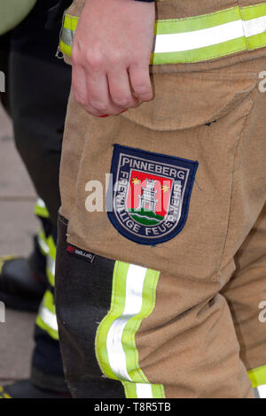 Laufen für Nächstenliebe, Feuerwehrmänner, Berlin, Deutschland Stockfoto