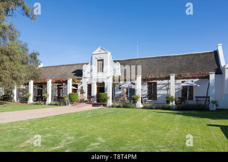 Bon Courage, Robertson Valley, Western Cape Town, Südafrika. Äußere des historischen Cape Dutch Homestead 1818 mit traditionellen g Stockfoto