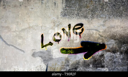 Wand Graffiti die Richtung Weise zu lieben Stockfoto