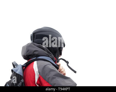 Skifahrer mit Helm und Ski Maske auf weißem Hintergrund Stockfoto