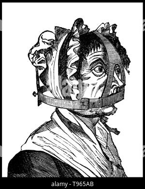 Ein schimpfen Bridle war ein Instrument der Bestrafung, als eine Form der Folter und der öffentlichen Demütigung. Das Gerät wurde eine eiserne Schnauze in einen eisernen Rahmen, der den Kopf umschlossen. Einen Zaum-Bit, ungefähr 2 Zoll lang und breit 1 Zoll, projiziert, in den Mund und drückte auf die Zunge. Stockfoto