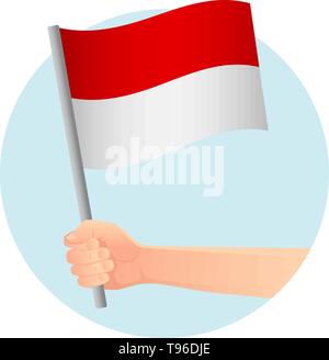 Indonesien Fahne in der Hand. Patriotischen Hintergrund. Nationalflagge von Indonesien Vector Illustration Stock Vektor