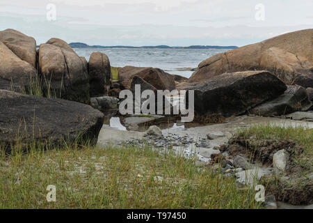 Annisquam ist ein kleines Dorf in Gloucester, Massachusetts Dies ist Wigwam PT auf der Annisquam River. Hier gibt es einen Leuchtturm und meist Wohnhäuser. Stockfoto