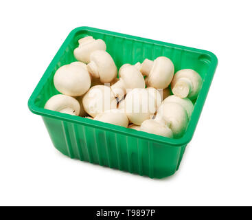 Frische champignon Pilze in der Verpackung auf weißem Hintergrund Stockfoto