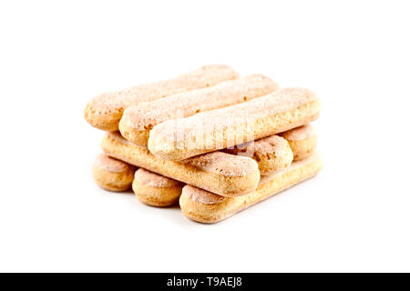 Traditionelle italienische savoiardi ladyfingers Cookies, Kekse auf weißem Hintergrund gestapelt. Stockfoto