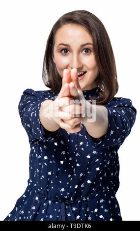 Hübsche junge Glücklich lächelnde Mädchen, gun Geste und zeigen auf Kamera auf weißem Hintergrund Stockfoto