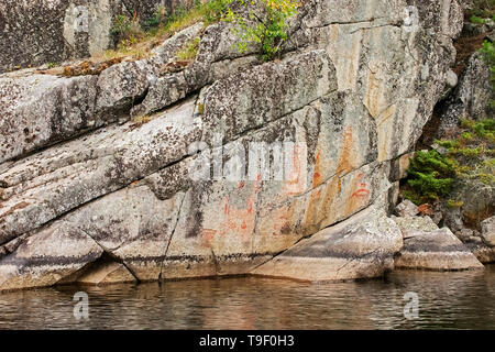 Piktogramme auf dem Felsen der Augenbinde See Kenora Bezirk Ontario Kanada Stockfoto