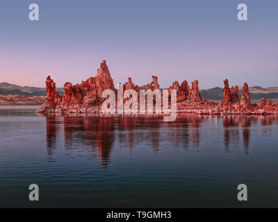 Glühende Steine auf bunten Sonnenuntergang am Mono Lake in der östlichen Sierra Stockfoto