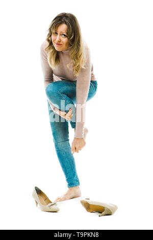 Business Woman in unbequemen High Heels und Leiden Fuß Ache Stockfoto