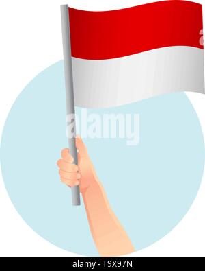 Indonesien Fahne in der Hand. Patriotischen Hintergrund. Nationalflagge von Indonesien Vector Illustration Stock Vektor