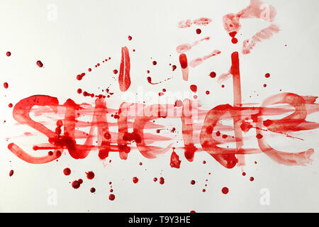 Wort Selbstmord in Blut geschrieben auf weißem Hintergrund Stockfoto