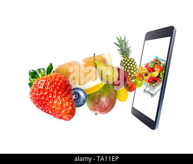 Frisches Gemüse und Früchte, Fliegen, Fallen in eine moderne, Gadget, Handy, auf einem weißen Hintergrund. Kreative Idee online einkaufen. Stockfoto