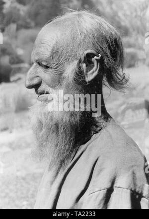 Die alte kafir Bagasch von Kafiristan (heute Nuristan) ist ein Anhänger der alten Natur Geist glauben. Die kafirs werden als Ungläubige und daher Kafiristan bedeutet "das Land der Ungläubigen" übersetzt. Stockfoto