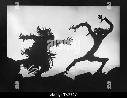 Das Foto zeigt eine Szene aus dem Silhouette Film "Die Abenteuer des Prinzen Achmed" von Charlotte Reiniger. Die silhouette Film, auch als Silhouette Animation bekannt, ist eine Technik der Animationsfilm in die Silhouetten zusammen auf einem beleuchteten Glasplatte vor einem weißen oder schwarzen Hintergrund gestellt werden, um einen Film zu bilden. Das Ergebnis ist die Silhouette Film, inspiriert von shadow Theater und der bildnerischen Techniken von Silhouette schneiden. Stockfoto