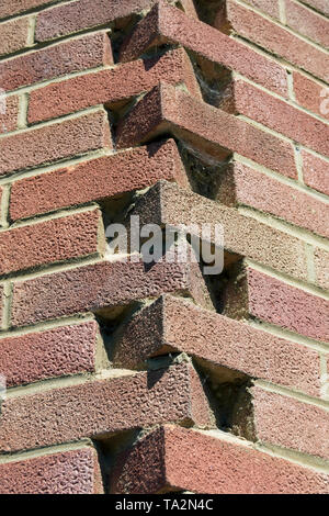 Dekorative Ecke Mauerwerk auf einem Gebäude in Barnes, London, England Stockfoto