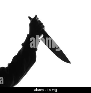 Silhouette der menschlichen Hand mit Messer auf weißem Hintergrund Stockfoto