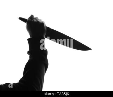 Silhouette der menschlichen Hand mit Messer auf weißem Hintergrund Stockfoto