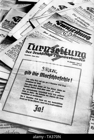 Titelseite der Zeitung der Deutschen Gymnastik Föderation. Die Zeitung fördert die Volksabstimmung im Dezember 1938. Bei den Parlamentswahlen, die Sudetendeutschen werfen ihre Abstimmung über die Annexion des Sudetenlandes an das Deutsche Reich. Stockfoto