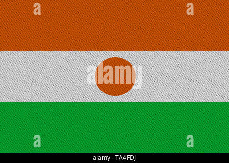 Niger Stoff Flagge. Patriotischen Hintergrund. Nationalflagge von Niger Stockfoto