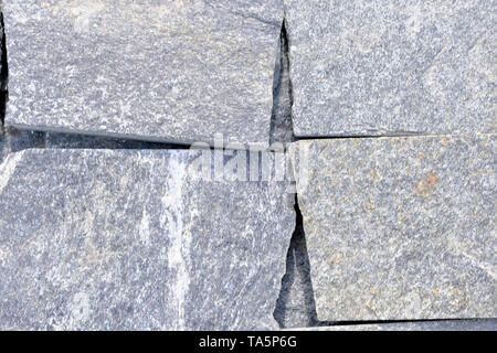 Dekorative Granitplatte Nahaufnahme Makro Foto Stein designer Hintergrund Stockfoto