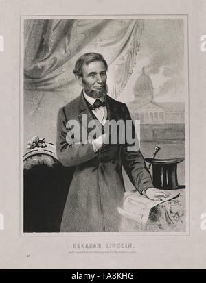 Abraham Lincoln, Three-Quarter Länge Porträt mit Hand auf Emanzipations-proklamation, von John H. Bufford, 1862 veröffentlicht. Stockfoto