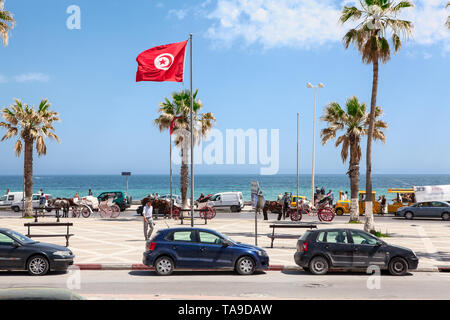 SOUSSE, TUNESIEN - ca. Mai, 2012: Die Bou Jaafar Strand befindet sich in der Avenue Hedi Chaker, Boulevard de la Corniche. Es ist ein Sandstrand Streifen Strand ist beliebt playgr Stockfoto