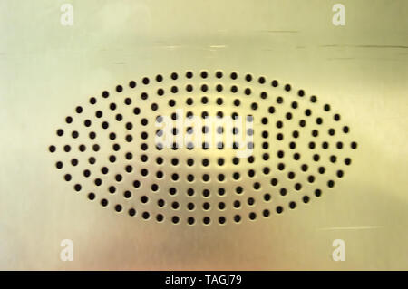 Metallische Farbe Hintergrund mit oval Piercing Stockfoto
