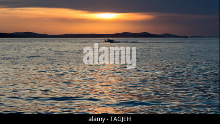 Sonnenuntergang über dem Meer in Zadar, Kroatien Stockfoto