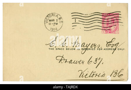 Victoria, British Columbia, Kanada, 2. März 1914: Kanadische Historische Postkarte mit schwarzer Tinte schreiben Kursiv, Bedruckt pink Briefmarke ein Cent Stockfoto