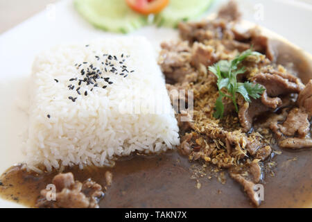 Reis mit gebratenem Schweinefleisch Stockfoto