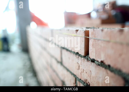 Maurer wand Wohnung reparieren Stockfoto