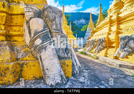 Die mittelalterliche stupas von Nget Pyaw Taw Paya Komplex sind mit schönen Skulpturen von Elefanten, Pindaya, Myanmar eingerichtet. Stockfoto