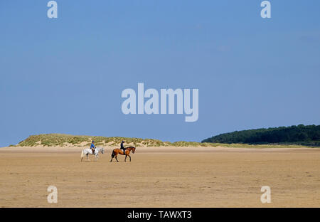 Reiten am holkham Beach, North Norfolk, England Stockfoto