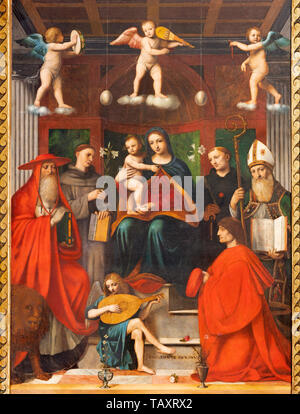 COMO, ITALIEN - 8. Mai 2015: Das Gemälde Madonna unter den Heiligen - Sacra Conversazione in Dom von Bernardino Luini (1481 - 1532). Stockfoto