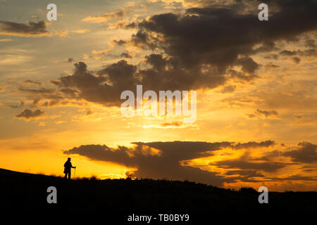 Wanderer sunrise, Bruneau Dunes State Park, Snake River Greifvögel National Conservation Area, Idaho Stockfoto