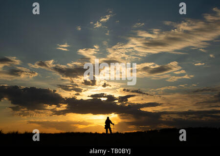 Wanderer sunrise, Bruneau Dunes State Park, Snake River Greifvögel National Conservation Area, Idaho Stockfoto