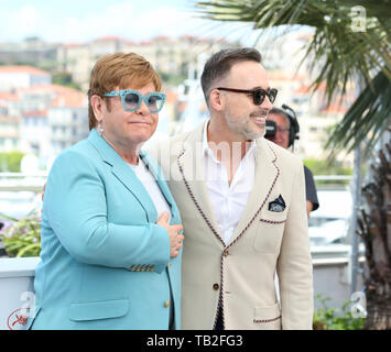 CANNES, Frankreich - Mai 16: Elton John und David versorgen nehmen an der "Rocketman" fotoshooting während der 72Nd Cannes Film Festival (Credit: Mickael Chavet/Pr Stockfoto