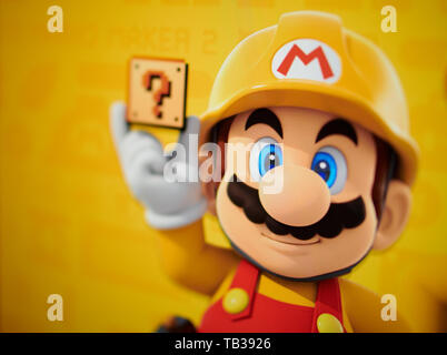 Nahaufnahme auf Super Mario - Charakter von Nintendo Plattform video Spiel auf gelben Hintergrund von der Website Bildschirm fotografiert. Stockfoto