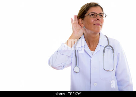 Studio shot reifer schöne Frau Doktor zuhören Während thi Stockfoto