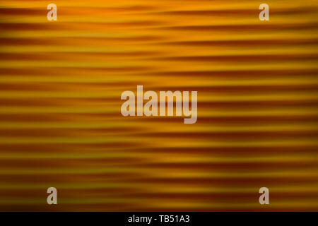 Abstrakte verschwommenen Hintergrund. Gold Linien und Kurven. Gestreifte Muster. Stockfoto