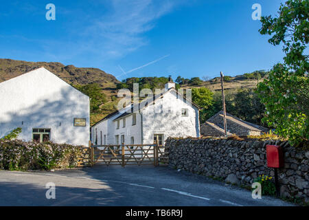 Der malerische Weiler Seatoller, Borrowdale, in der Nähe von Keswick, Lake District, Cumbria, Großbritannien mit traditionellen Steinhäusern Stockfoto