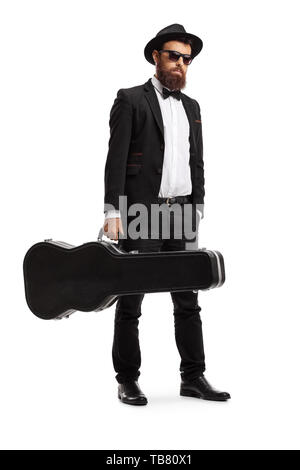 In voller Länge Porträt einer männlichen Musiker mit einer E-Gitarre auf weißem Hintergrund Stockfoto