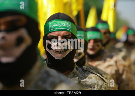 Bagdad, Irak. 31. Mai, 2019. Irakische Gruppe Kämpfer März während einer Parade Kennzeichnung der jährlichen al-Quds (Jerusalem) am letzten Freitag des muslimischen Fastenmonats Ramadan. Credit: Ameer Al Mohammedaw/dpa/Alamy leben Nachrichten Stockfoto