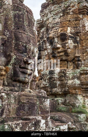 Gesichter des Buddha in Bayon Tempel in Angkor Wat, Kambodscha Stockfoto